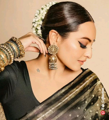 Middle Parted Tight Bun - hairstyle for saree

